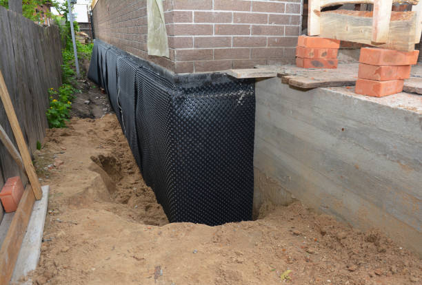 Happy homeowners after waterproofing job in Macedon